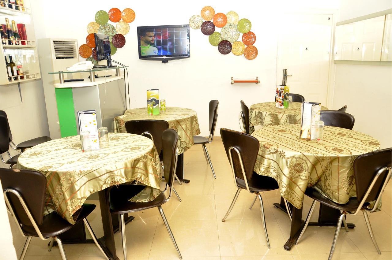Theodawn Hotels @ Suite 29 Икеджа Екстериор снимка